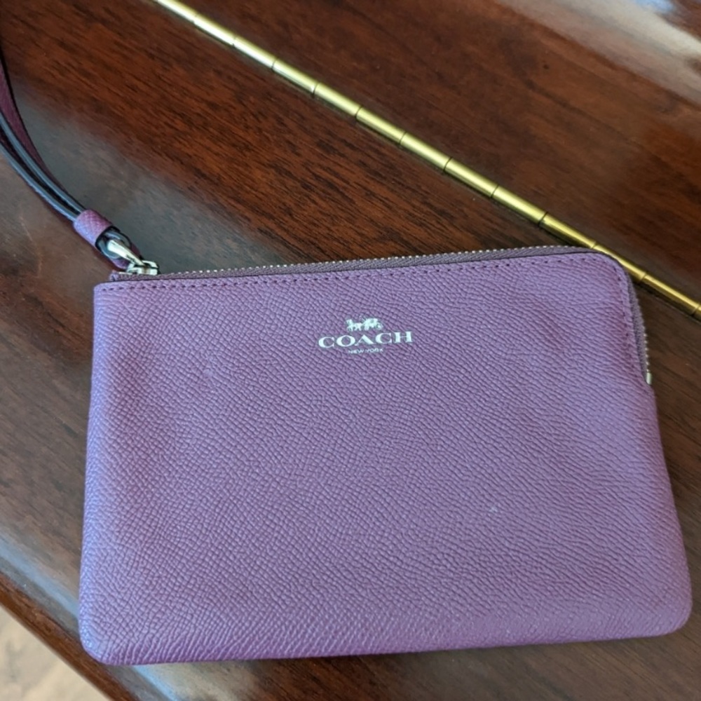 Plum Coach Wristlet